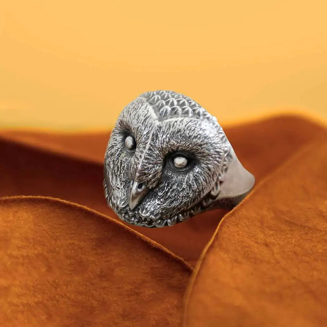 Silver ring barn owl