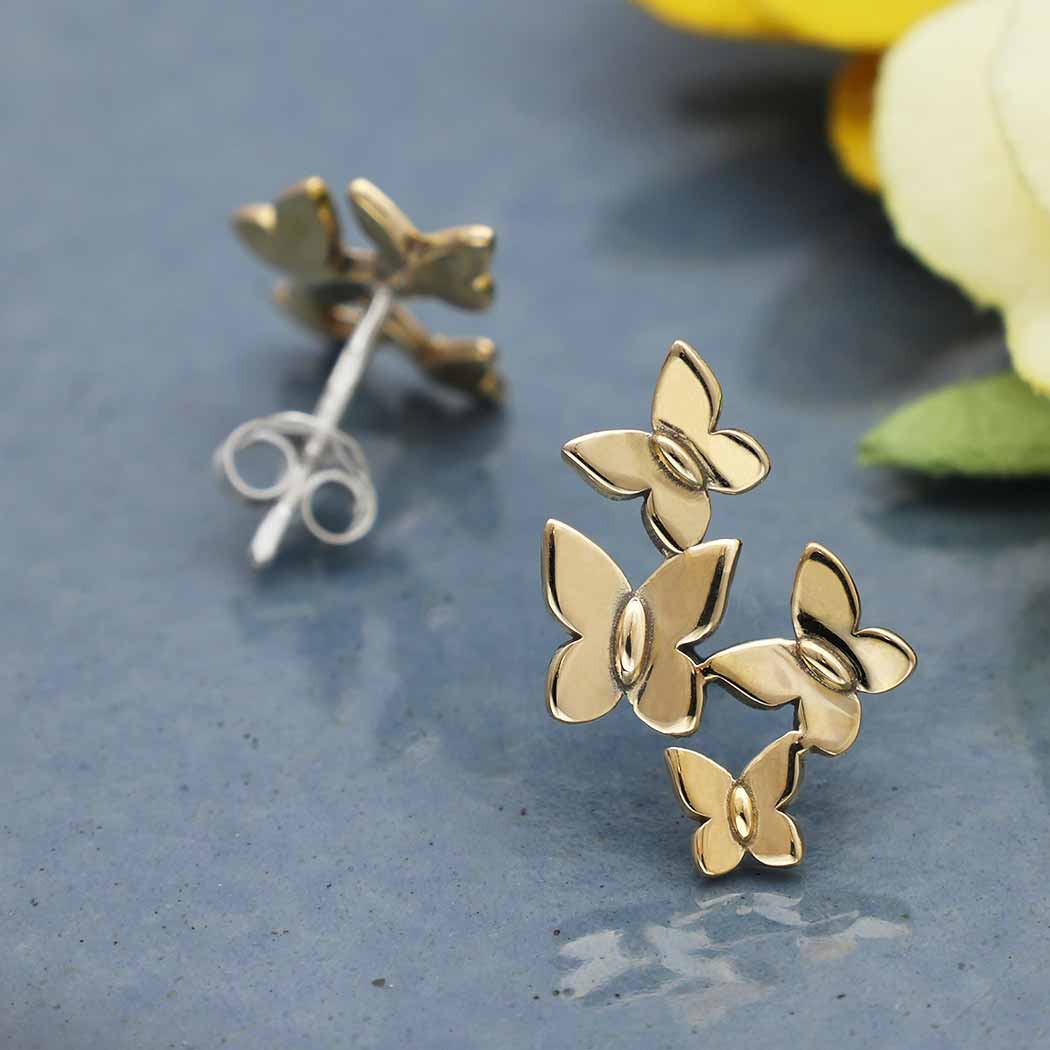 Silver earrings with bronze butterfly swarm