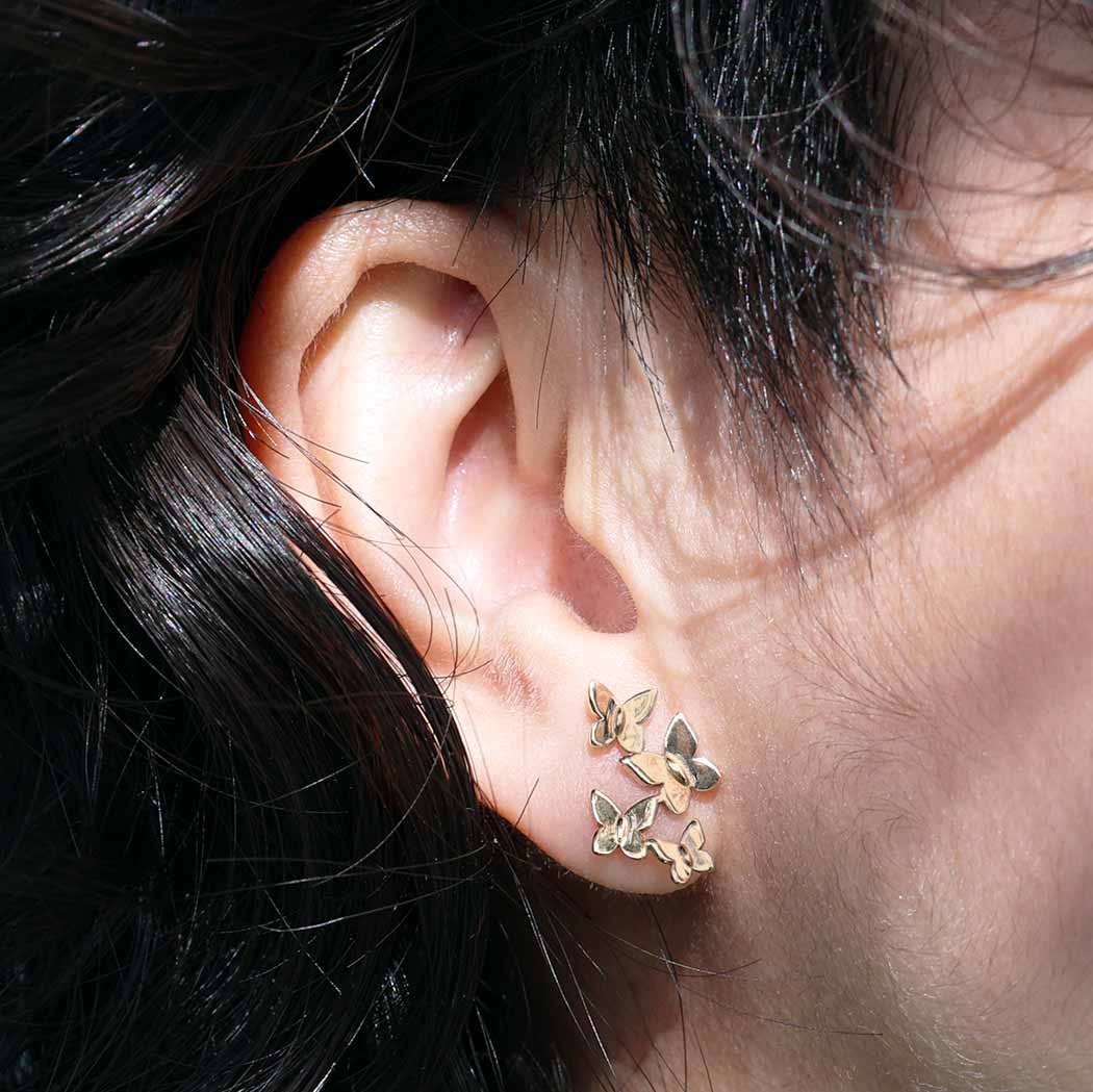 Silver earrings with bronze butterfly swarm