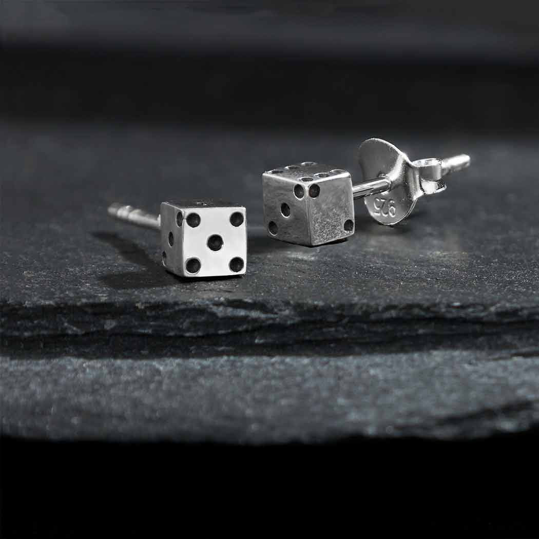Silver earrings die
