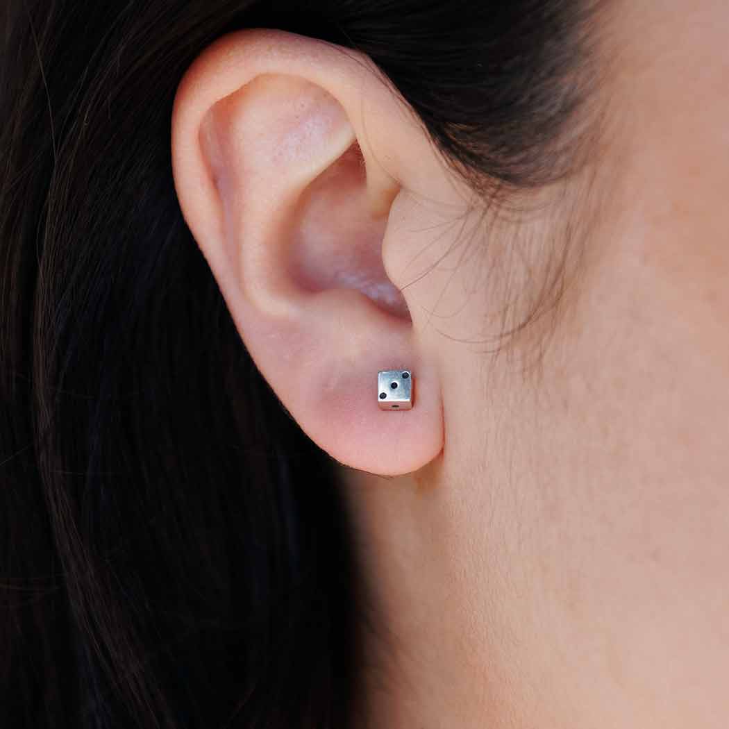 Silver earrings die