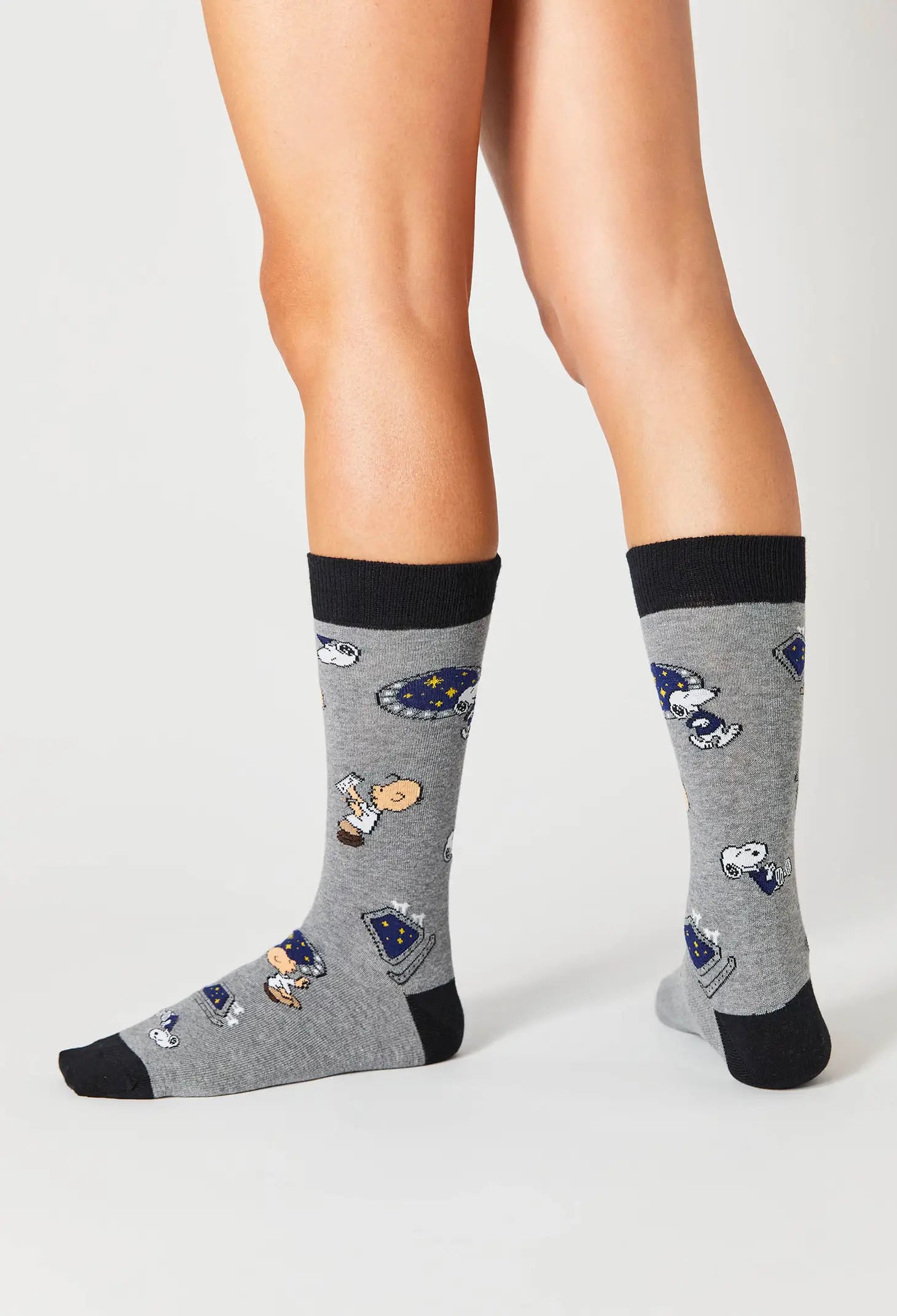Chaussettes Snoopy sur un vaisseau spatial