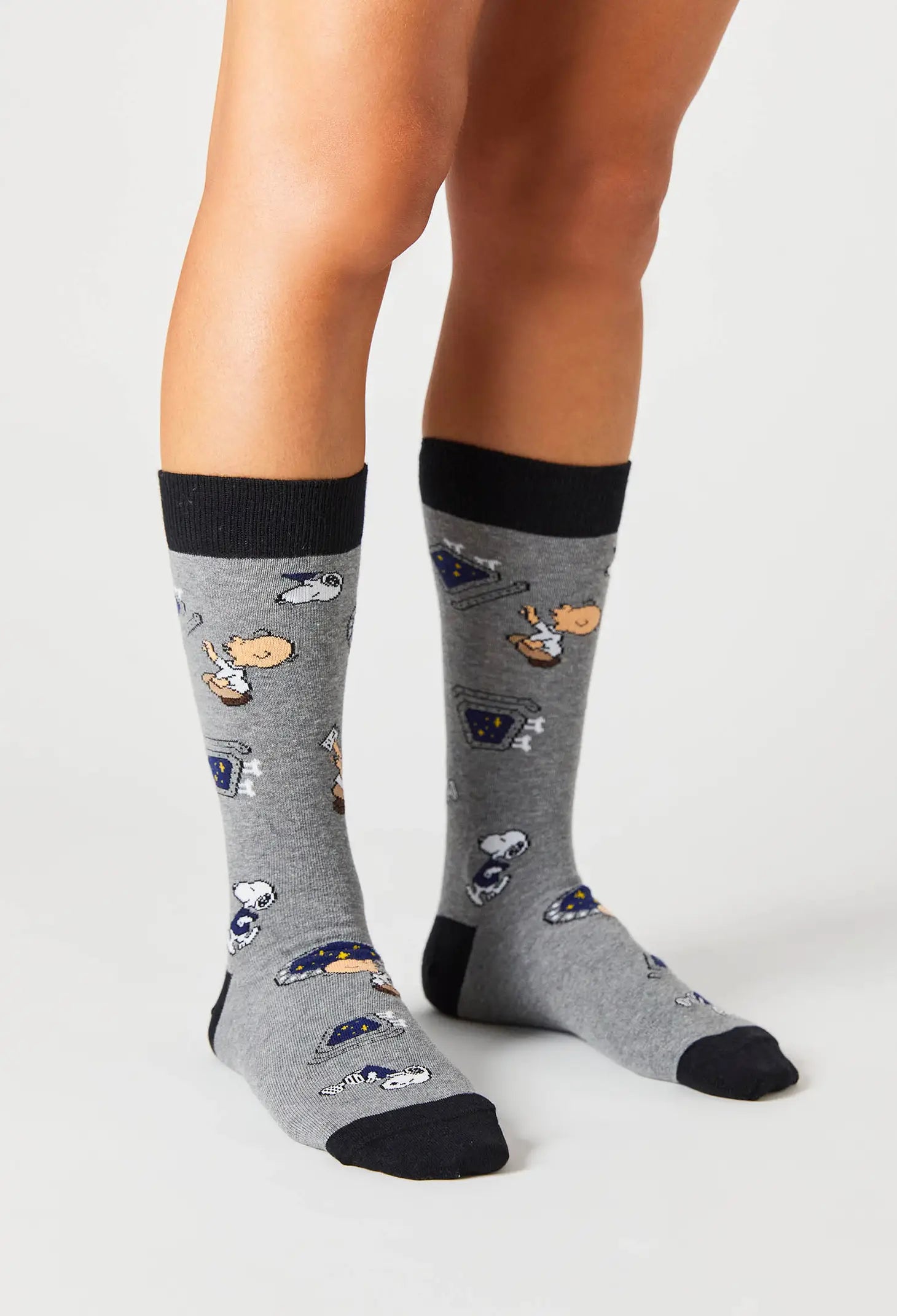 Chaussettes Snoopy sur un vaisseau spatial
