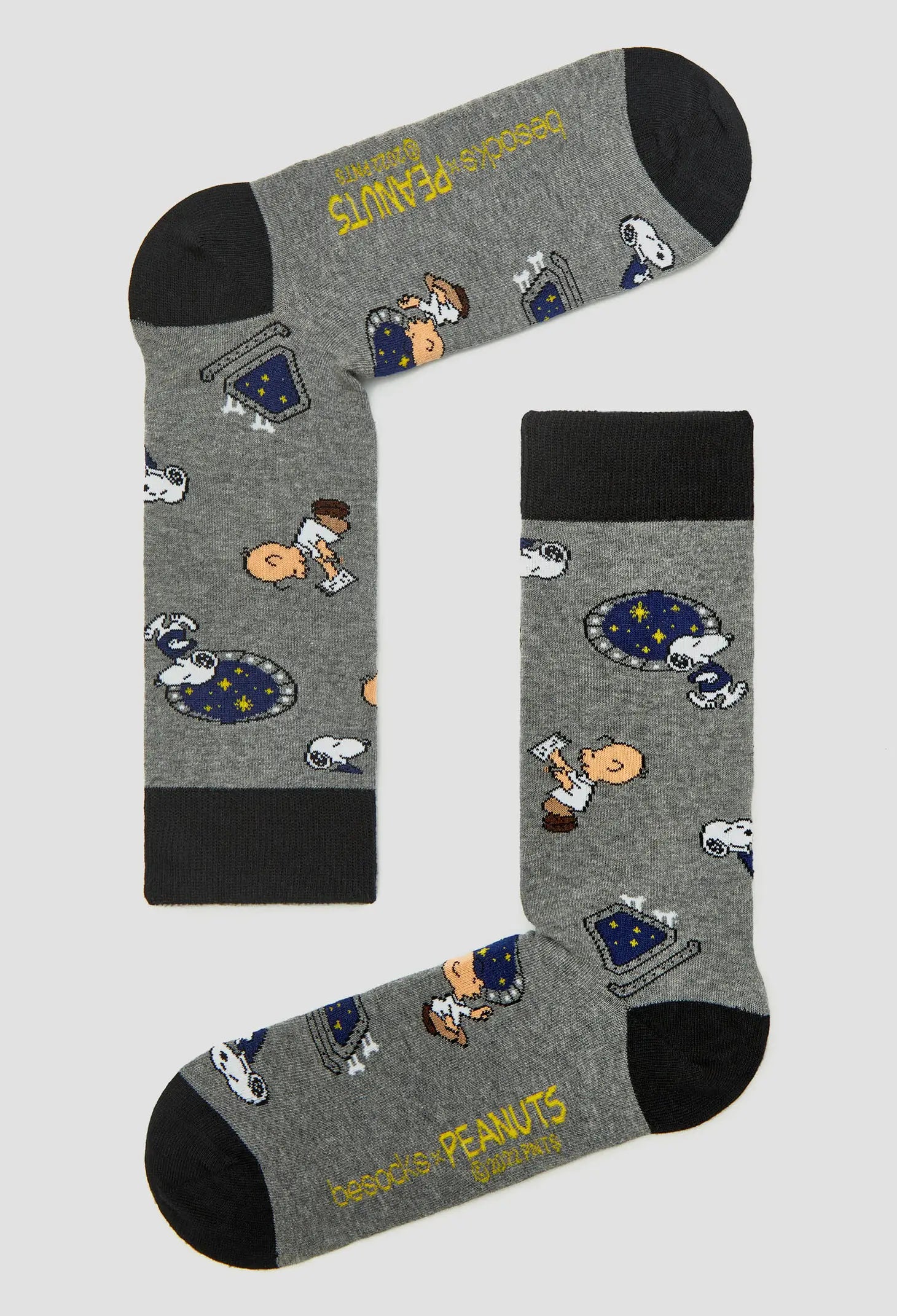 Chaussettes Snoopy sur un vaisseau spatial