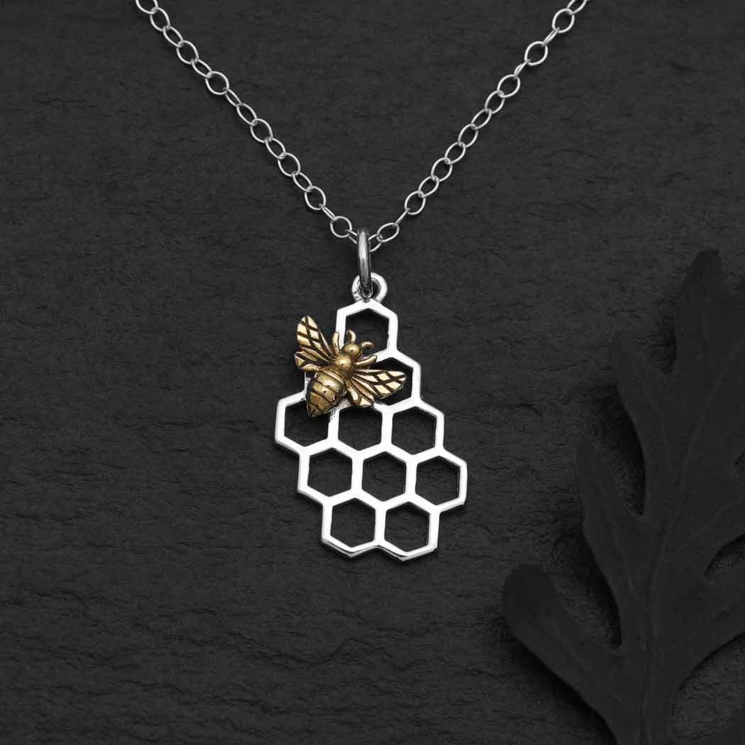 Silver honeycomb necklace with bronze bee