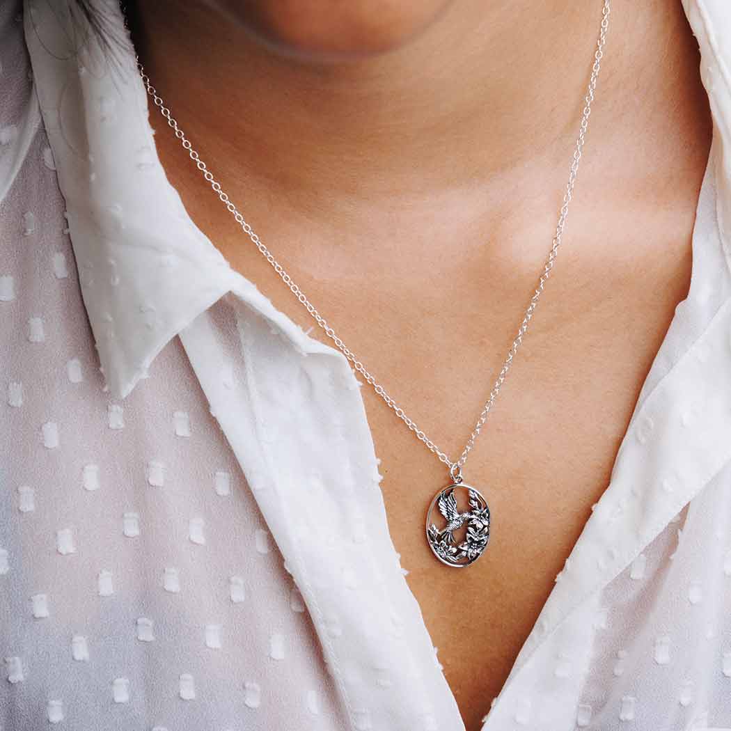 Silver necklace flowers with hummingbird