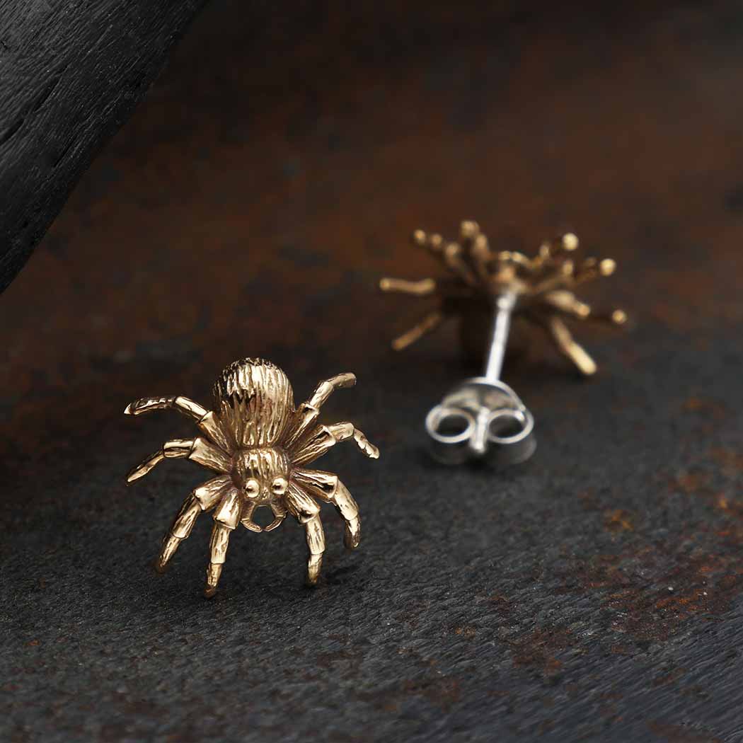 Silver earrings with bronze spider