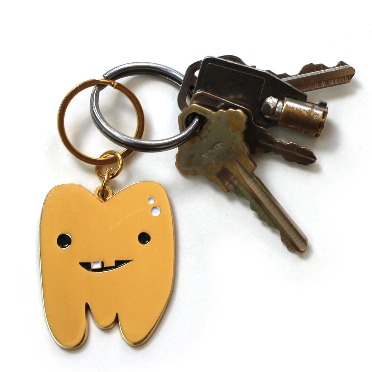 Porte-clés dent en or - Vous ne pouvez pas manipuler la dent !