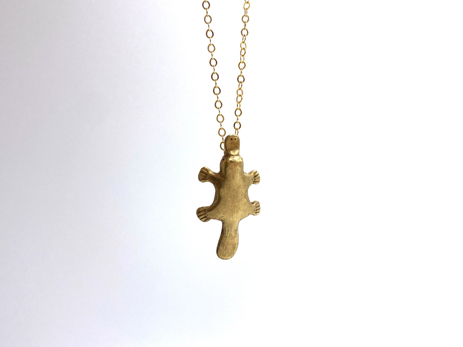 Gold filled necklace with bronze platypus