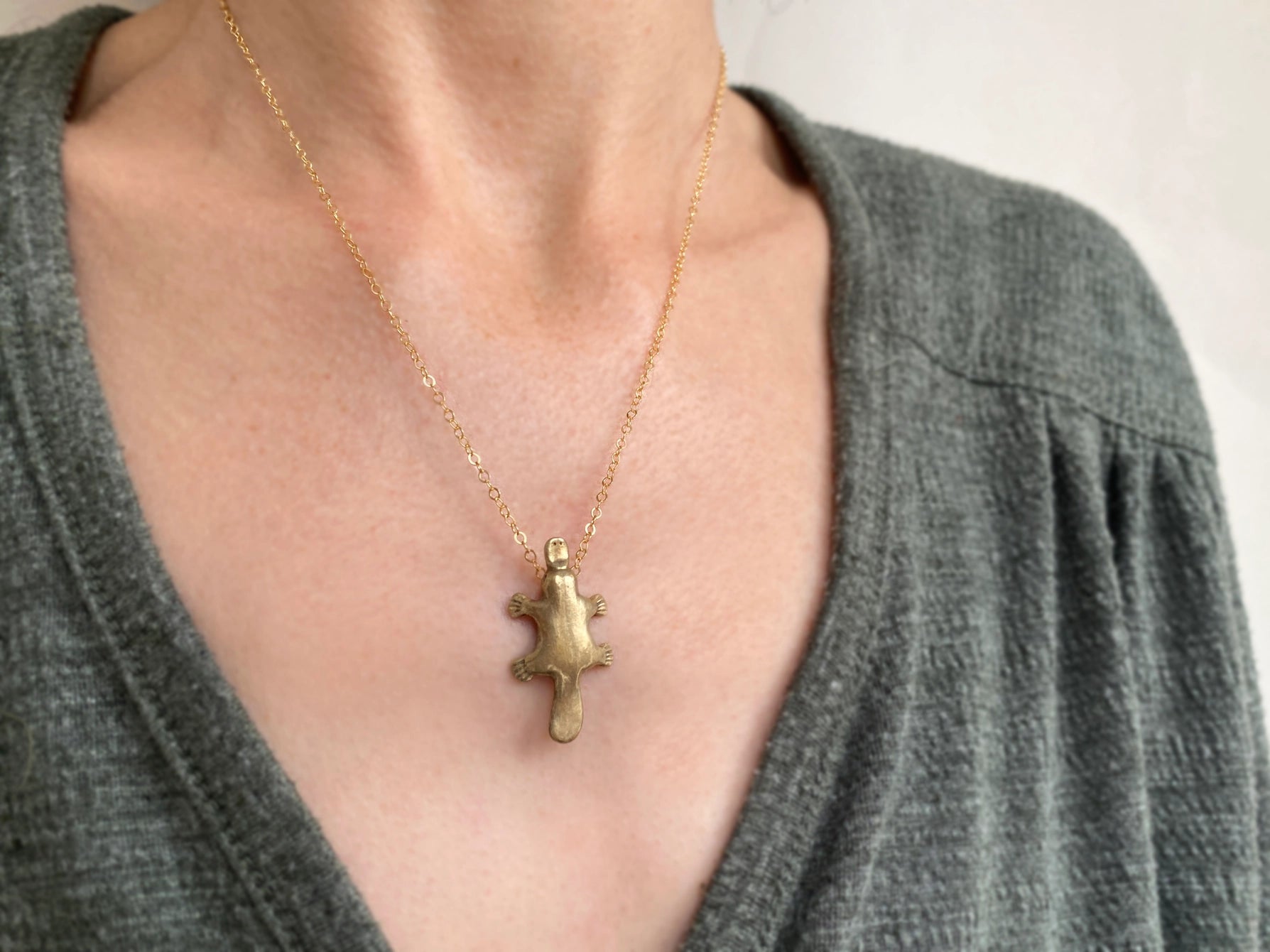 Gold filled necklace with bronze platypus