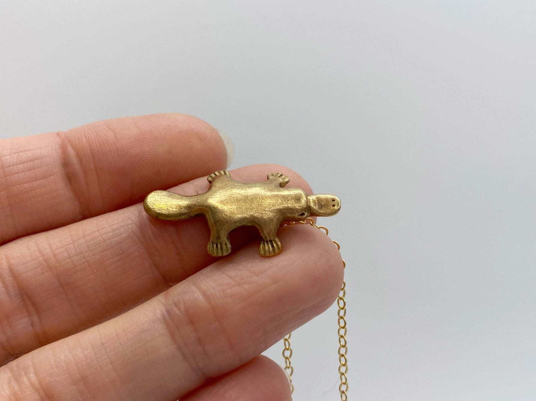 Gold filled necklace with bronze platypus