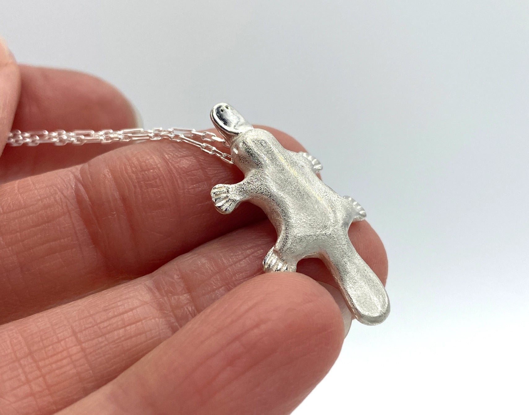 Silver necklace platypus