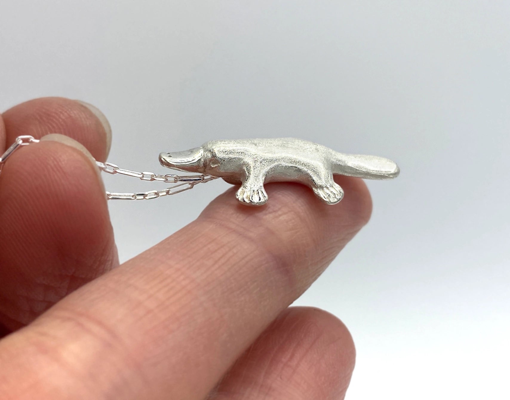 Silver necklace platypus