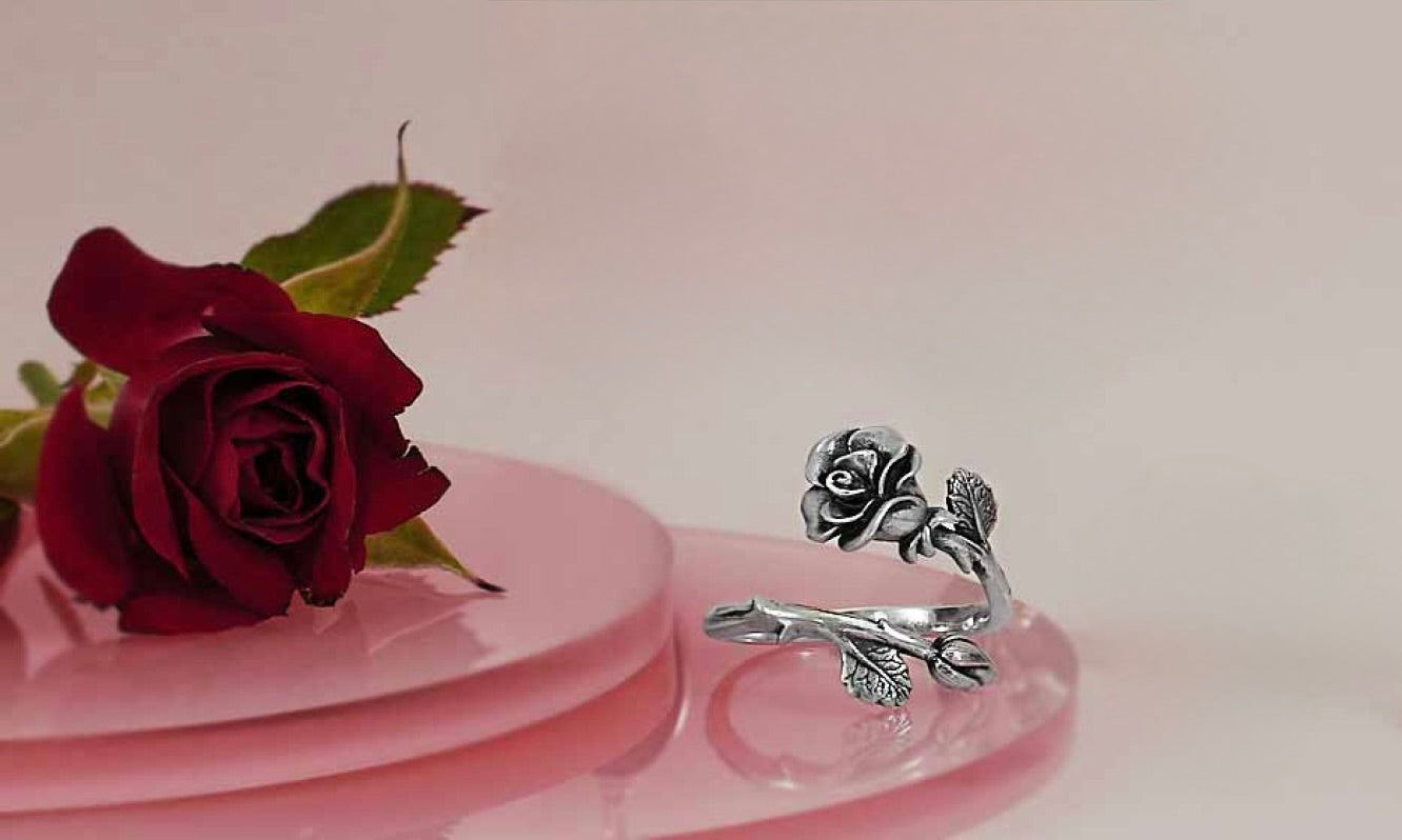 Zilveren ring roos en rozenknop